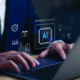 professional using AI on their laptop